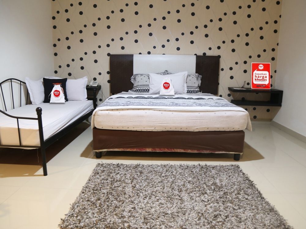 Hotel Mangga Dua Makassar Buitenkant foto