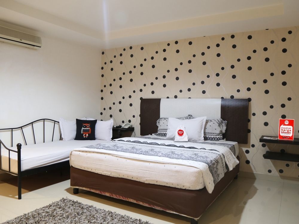 Hotel Mangga Dua Makassar Buitenkant foto